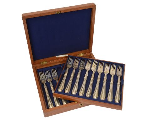 A set of twelve Victorian silver bead pattern fish forksBirmingham, 1873 by John Gilbert &amp; Co., each fork engraved with a