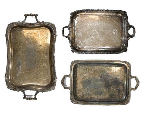 An early 19th century century Old Sheffield plate twin handled tray c. 1830, a large late Victorian electroplated and another