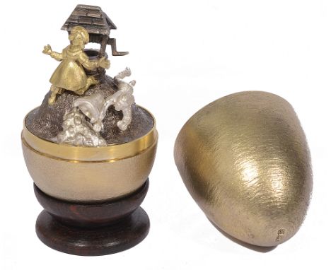 A cased silver-gilt surprise 'Jack and Jill' egg, by Stuart Devlinmarked London, 1977, the limited edition 'Jack and Jill' eg