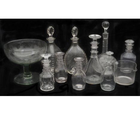 A pair of Whitefriars Spanish cut tri-form decanters and stoppers designed by Harry Powell c.1910 and selection of 19th centu