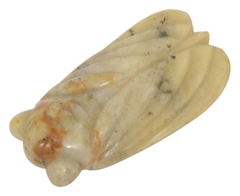 A Chinese jade carved pendant of a cicada pale celadon with black and russet veining,length 5.5cmCondition: Overall good cond