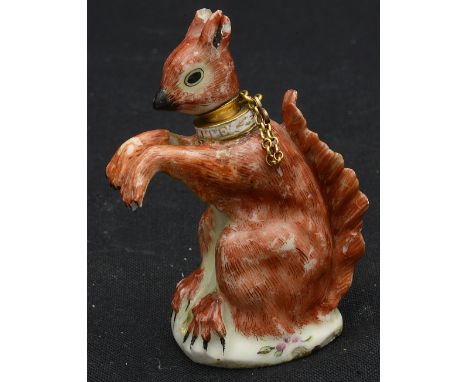 A St. James's (Charles Gouyn) porcelain gold mounted scent bottle and stopper c. 1749-60moulded in the form a seated red squi