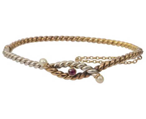 A Victorian gem-set and two coloured gold hinged bangle, of rope twist design, the top section centrally-set with a ruby coll