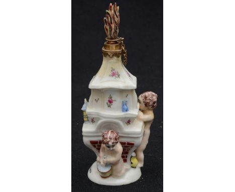 A St. James's (Charles Gouyn) porcelain gold mounted scent bottle and stopper c.1749-60moulded as a putto pumping bellows at 