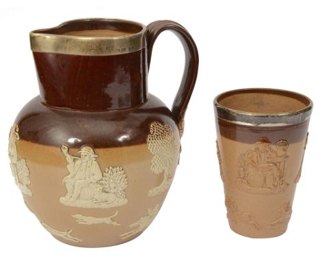A Victorian silver mounted Doulton Lambeth salt glazed stoneware ale jug and beaker the silver mounts marked London, 1889 by 