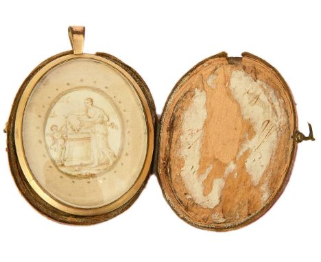 A Georgian gilt metal framed memorial locket c.1800oval, painted in sepia on paper with a classical maiden and a putto holdin