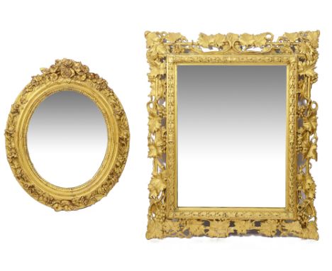 Two 19th century giltwood and gesso framed wall mirrorsfirst rectangular with husk border and pierced and carved fruiting vin