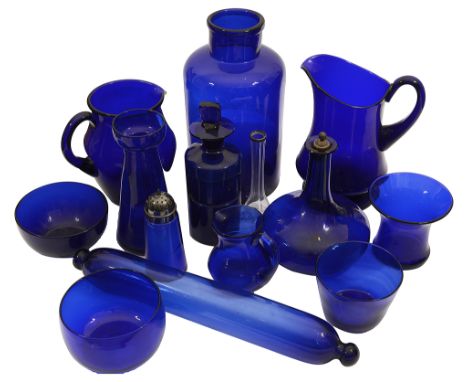 19th century and later mostly Bristol blue glasscomprising two water jugs with loop handles, an onion shaped decanter and sto