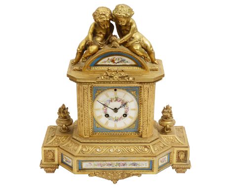 A late 19th French Louis XVI style ormolu mounted Sevres style porcelain mantle clockthe rectangular dial painted with gilt R