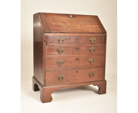 A 19th century George III mahogany ladies bureau writing table desk. Raised on bracket feet with a series of drawer under a f