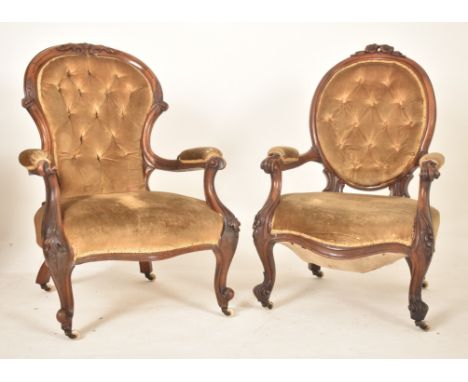 A pair of Victorian 19th century mahogany framed &amp; velvet upholstered button back His &amp; Hers armchairs. Each chair ha
