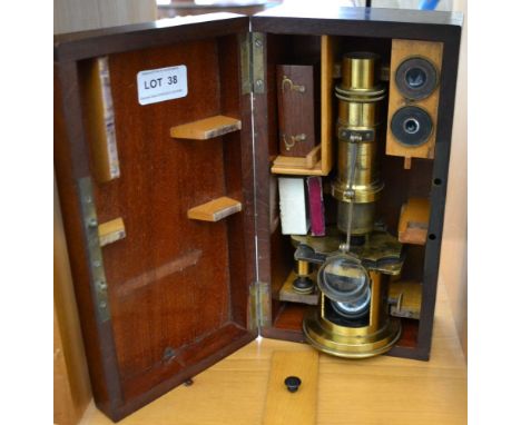 A Nachet Opticians Microscope, inscribed "Nachet Opticien Rue Serpente 16, Paris", in fitted wooden case, with accessories