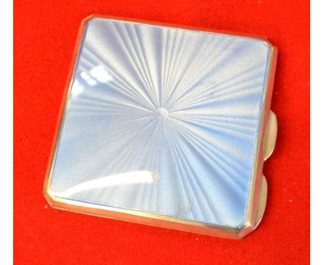 Mappin &amp; Webb. A silver and blue guilloche enamel compact, square form with canted corners, engine turned decoration to u
