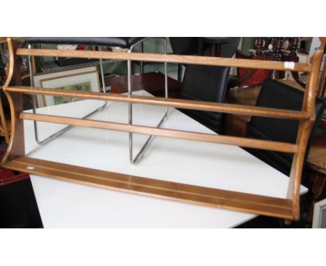 An Ercol wall shelf