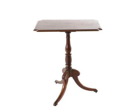 A Regency Mahogany Tripod Table, early 19th century, of rectangular form with re-entrant corners on a baluster and turned sup