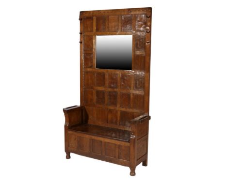 Mouseman: A Robert Thompson English Oak Hall Stand, with penny moulded top above a panelled back inset with a mirror surround