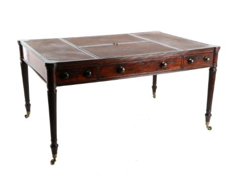 An Early 19th Century Mahogany Writing Table, in the manner of Gillows, with brown leather writing surface and hinged ratchet