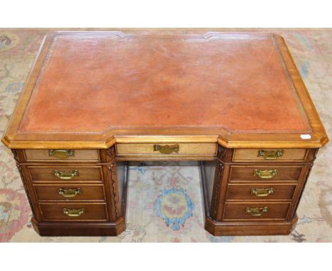 A Mahogany Coffee Table in the Form of Inverted Breakfront Partner's Desk, modern, with a leather and gilt Greek key border w