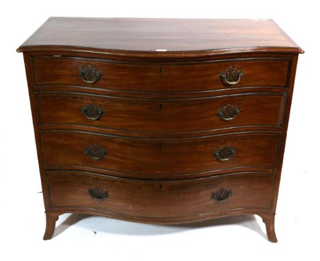 A George III Mahogany and Crossbanded Serpentine Shaped Chest of Drawers, early 19th century, with four graduated drawers, on