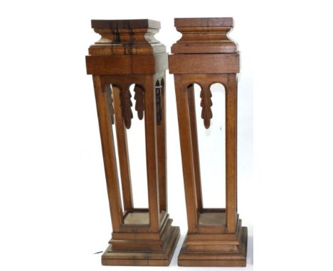 Mouseman: A Pair of Robert Thompson English Oak Plant Stands, the stepped square tops above four supports with carved leaf pe