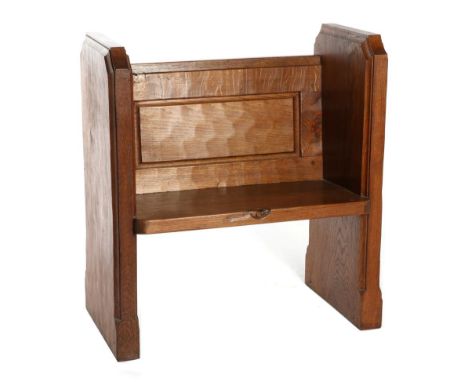 Mouseman: A Robert Thompson English Oak Monk's Bench, shaped ends, panelled back with book trough, solid seat, with recessed 