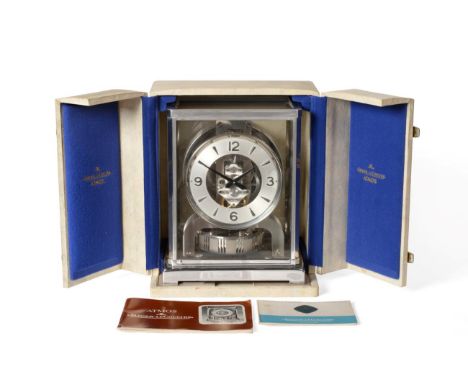 A Rhodium Plated Atmos Clock, signed Jaeger LeCoultre, 2nd half 20th century, case with glazed panels, 4-1/4-inch silvered di