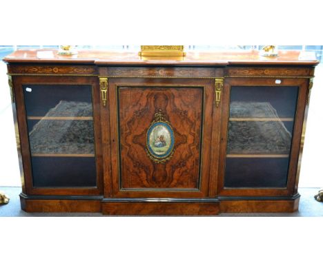 A Victorian Figured Walnut, Marquetry Inlaid and Gilt Metal Mounted Credenza, 3rd quarter 19th century, the central cupboard 