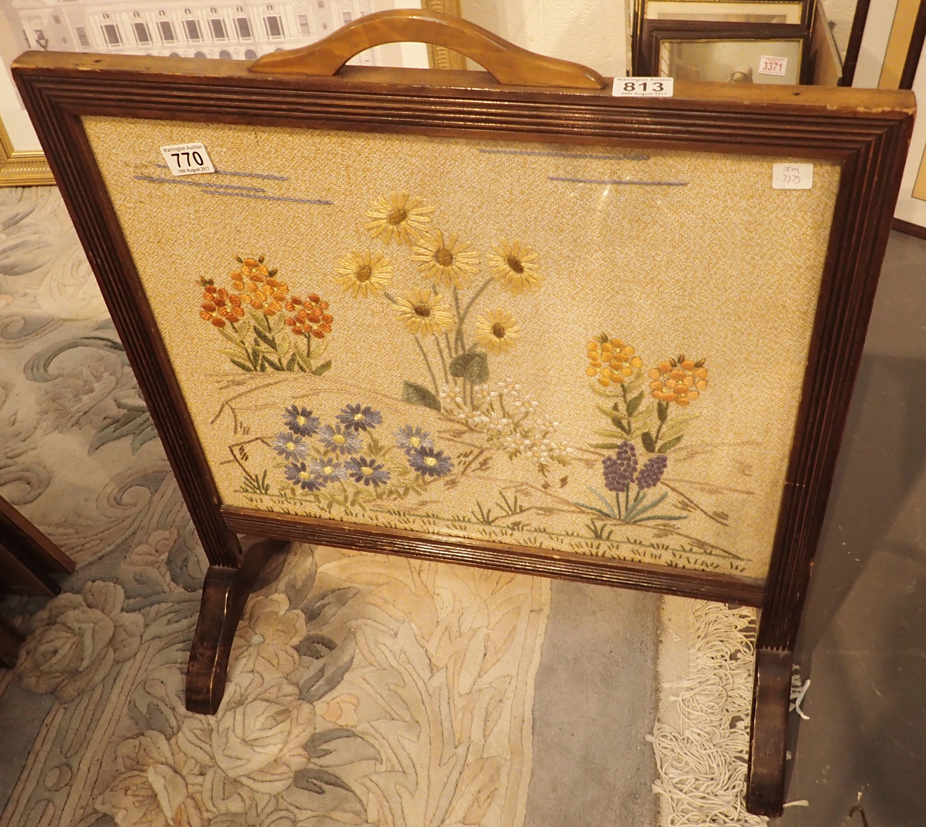 Embroidered oak framed fire screen