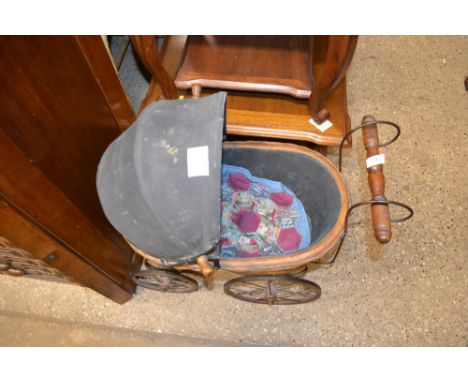 A vintage dolls pram and a small chair 