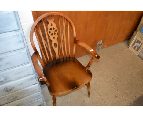 A stick and wheelback carver chair 