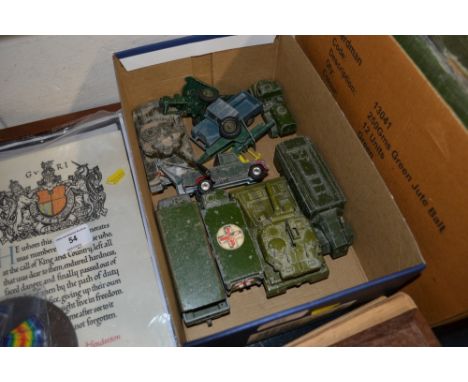 A box of Dinky toy army vehicles 