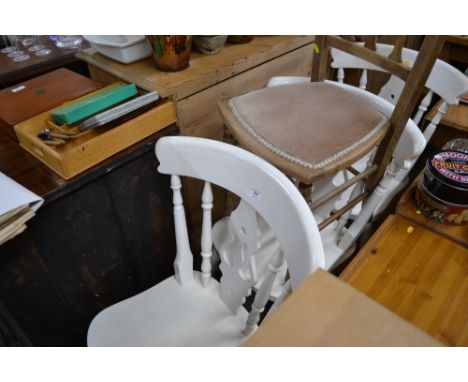 Three white painted kitchen chairs; and a side chair 