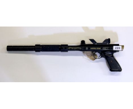 A vintage Brass Eagle King Cobra paintball gun.