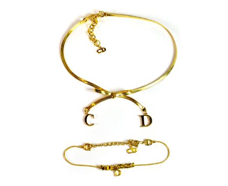 A Christian Dior gold plated necklace and bracelet.