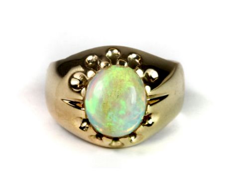 A heavy 9ct gold gents ring set with a 3.1ct opal, 13.7 gms approx (W).