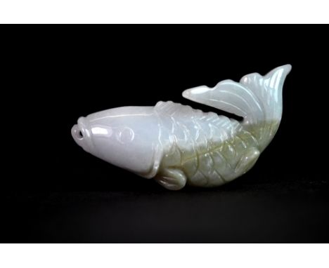 A lovely mixed colour carved jade fish amulet, L. 5.5cm.