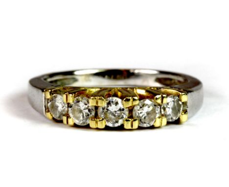 A white and yellow metal (tested 18ct gold) 5 stone diamond ring (K).