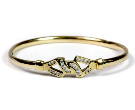 A 9ct gold stone set hinged bangle, 8.8g approx.