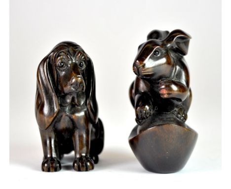 2 signed rosewood netsuke of animals.