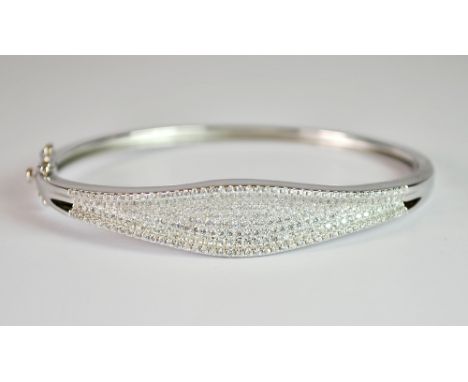 A 925 silver and stone set hinged bangle.