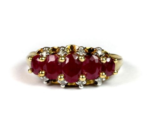 A 9ct gold 5 ruby and diamond ring (P.5).