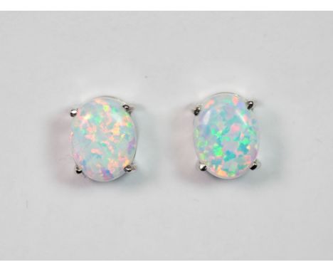 A pair of 925 silver and faux opal earrings.