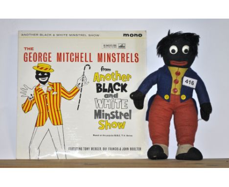 A vintage felt Golly figure and a Black and White Minstrels LP record.