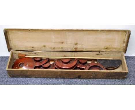 An early wooden cased carpet game.