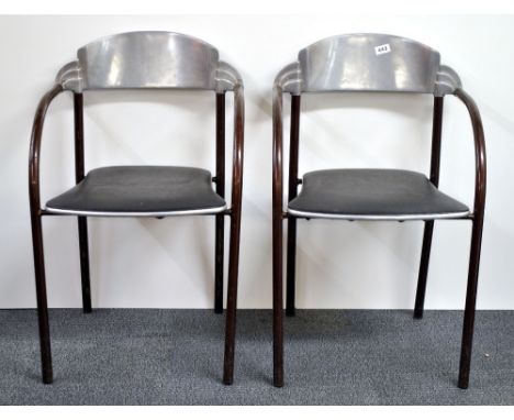A pair of vintage aluminium Miss Italia cafe chairs.