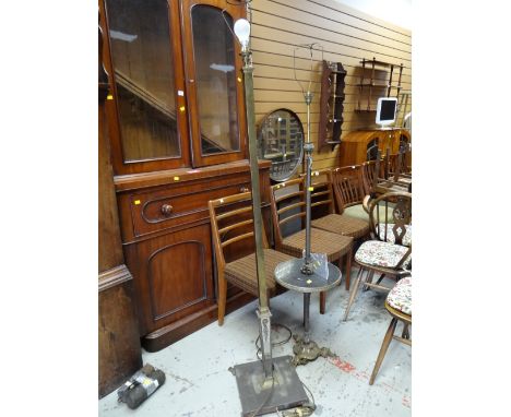 Two vintage brass effect standard lamps, one with a lower shelf