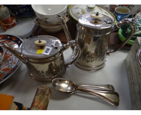 A good quality EPNS teapot & water jug engraved with trailing roses together with four EPNS serving spoons 