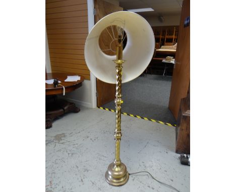 A vintage brass effect barley-twist column standard lamp