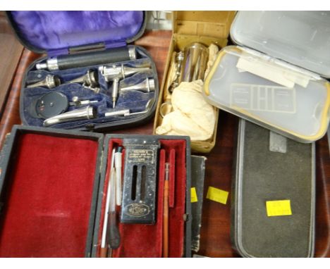 Selection of various vintage cased medical instruments