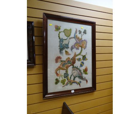 A darkwood framed embroidery / tapestry of flowers signed by R. Rhys dated 1936
